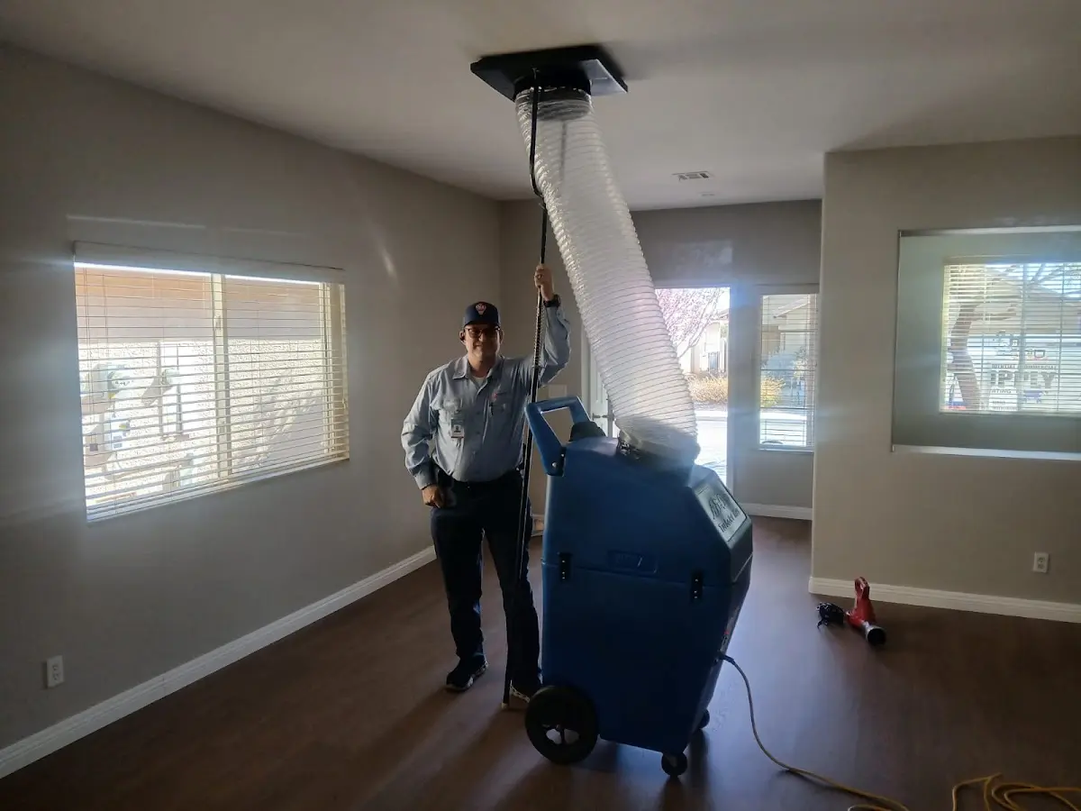 Professional Dryer Vent Cleaning work inside a Richmond home